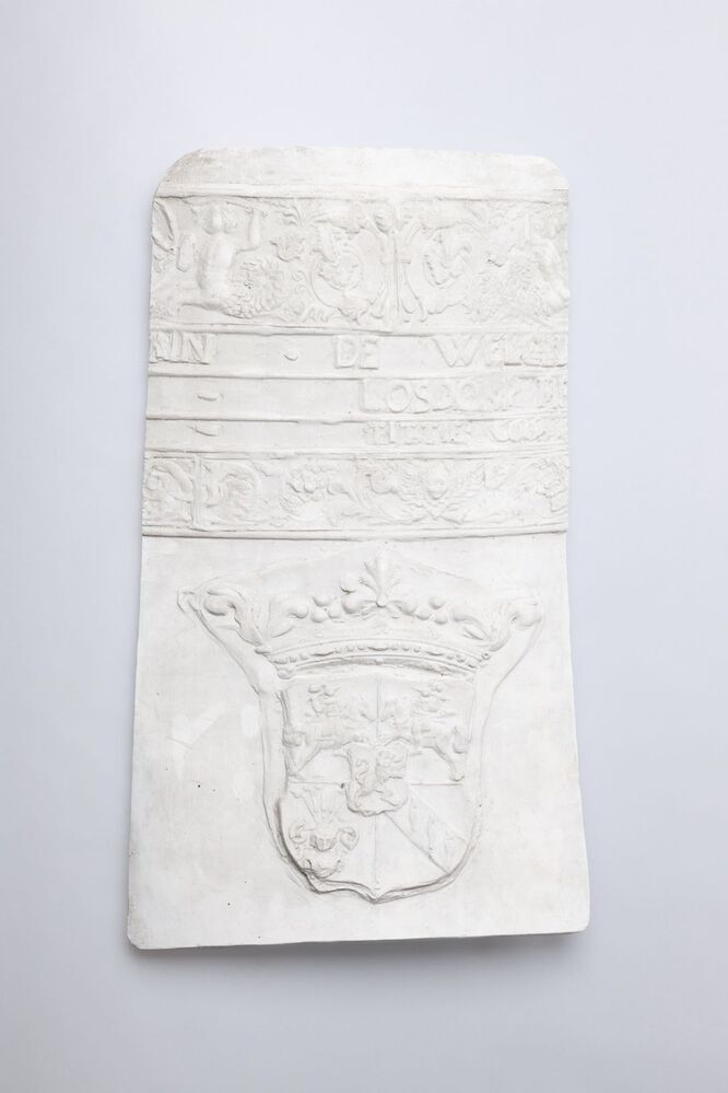 Gipsafgietsel van de klok te Losdorp