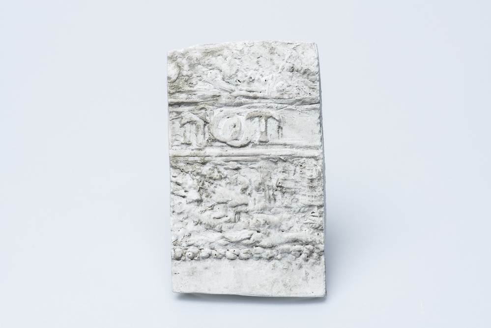 Gipsafgietsel van de klok te Warffum