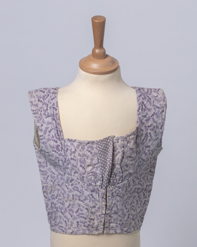 Onderlijfje van wit en paars bedrukt katoen