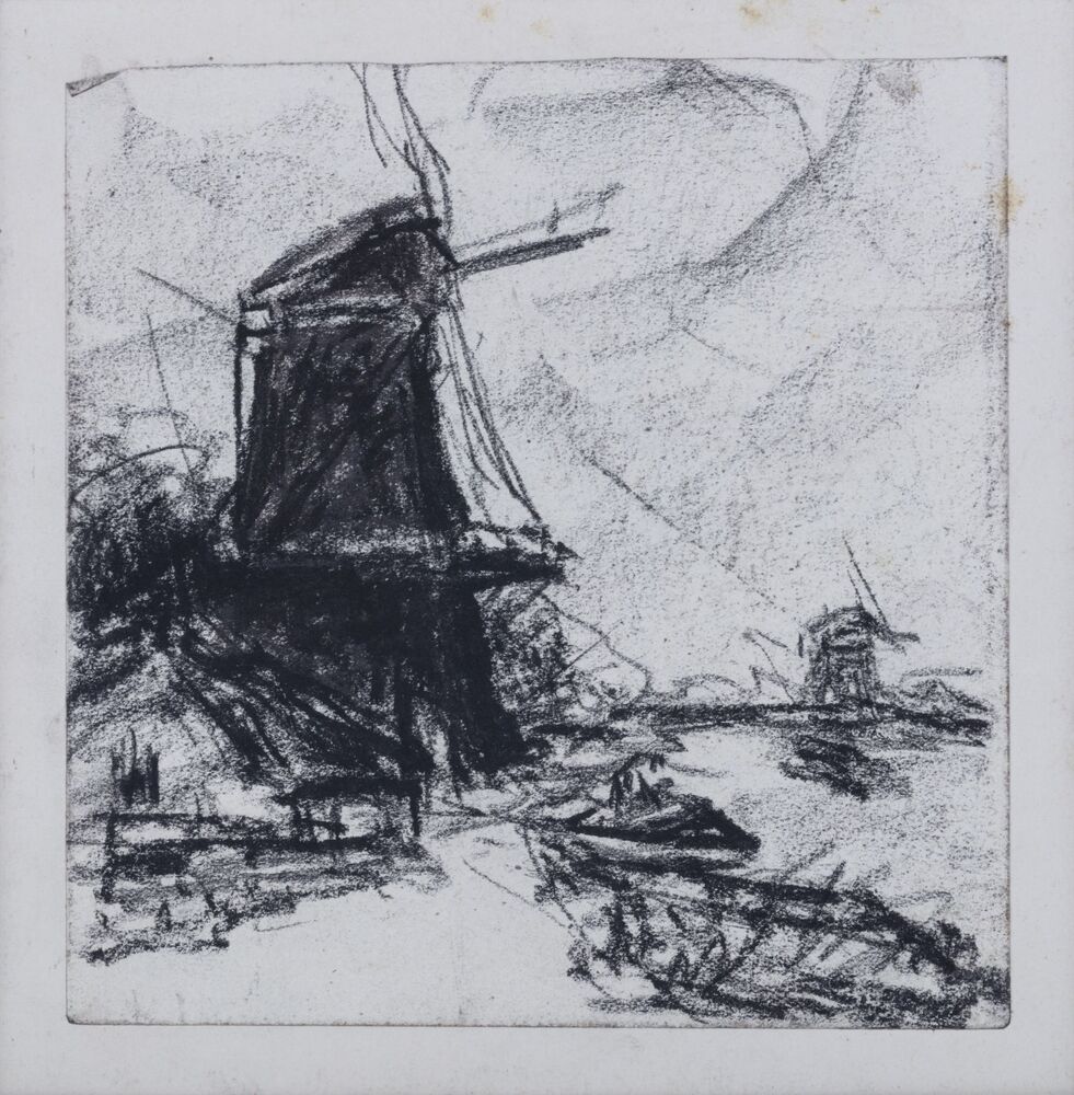 Molen met huisjes aan water