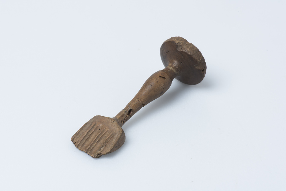 houten instrumentje om boter mee te versieren