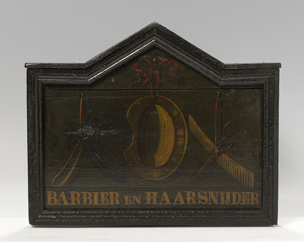 Uithangbord barbier en haarsnijder