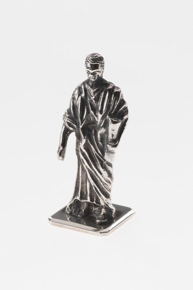 Miniatuur beeldje van man