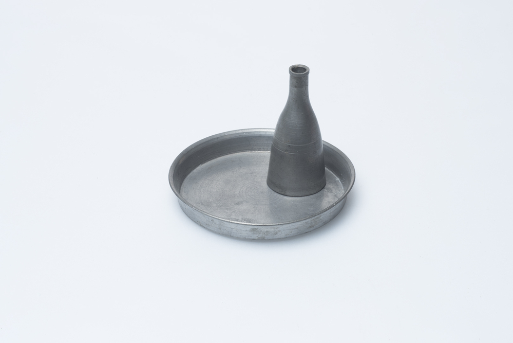 Miniatuurversie presenteerblad met fles