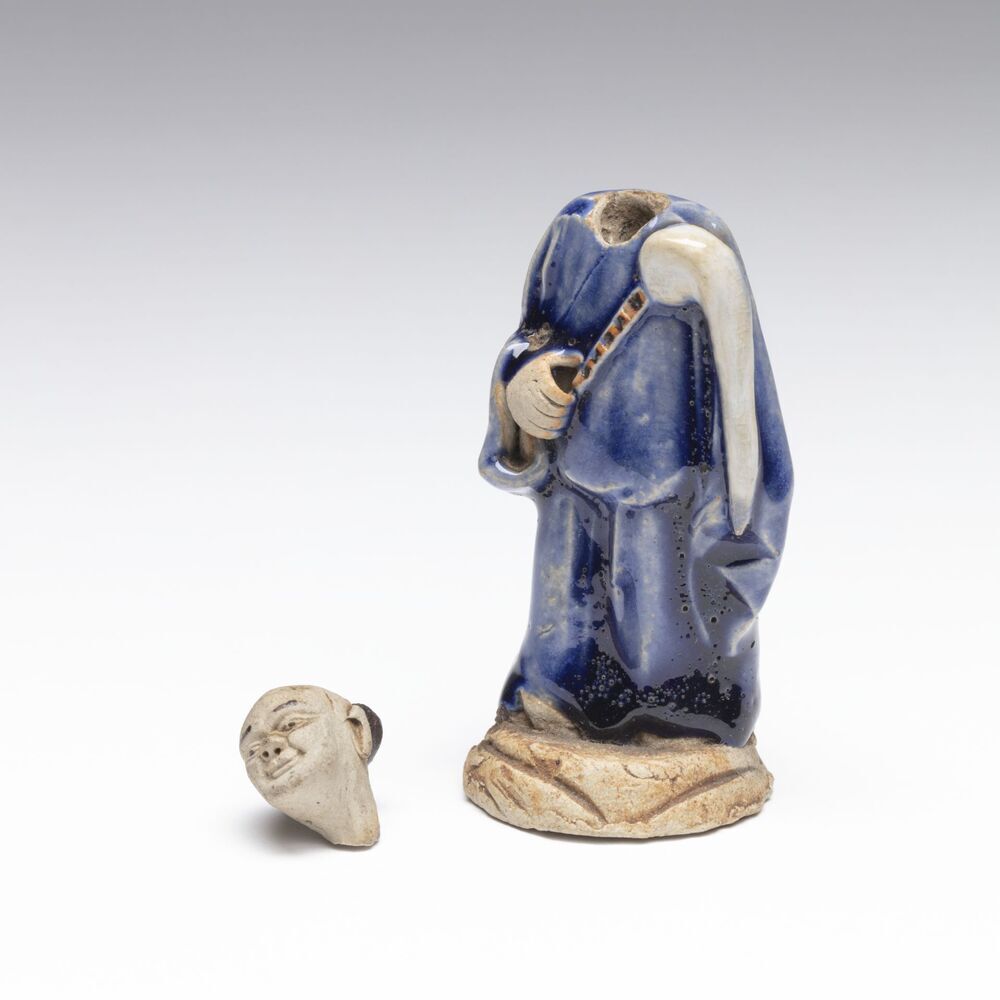 Beeldje van Chinese man