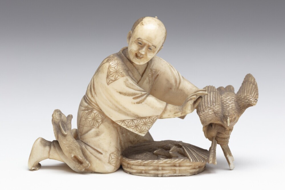 Netsuke "vogelverkoper"