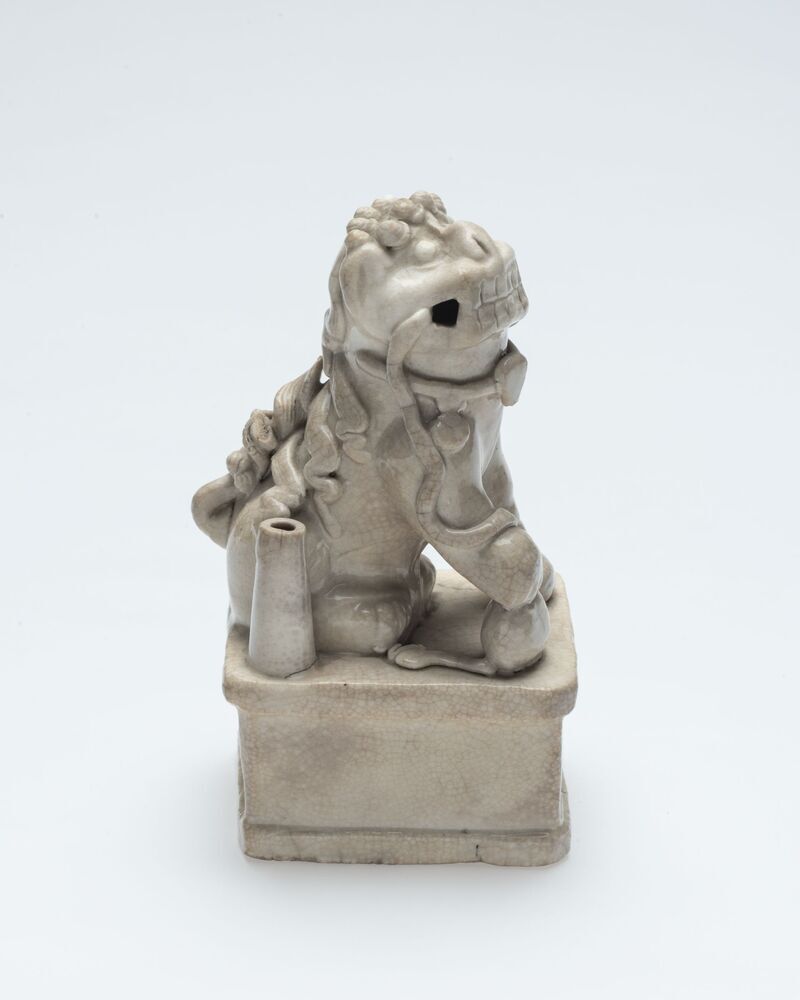 Beeldje van de hond van Boeddha