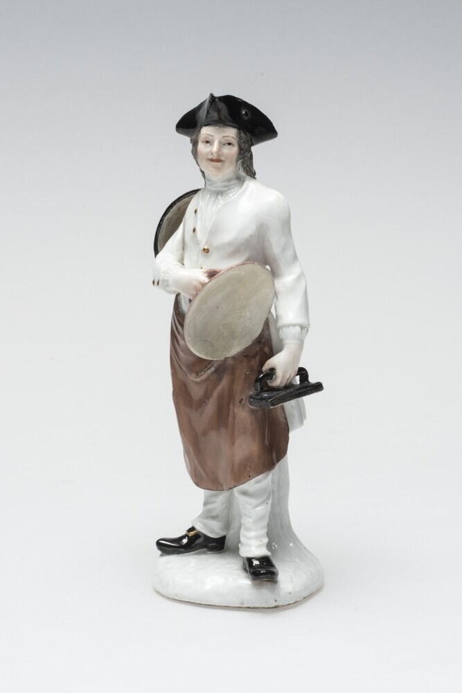 VERVALLEN Beeldje van een ketellapper