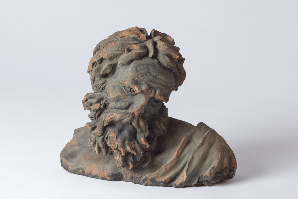 Mannenkop van terracotta