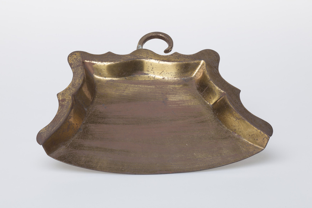 Stofblikje van messing