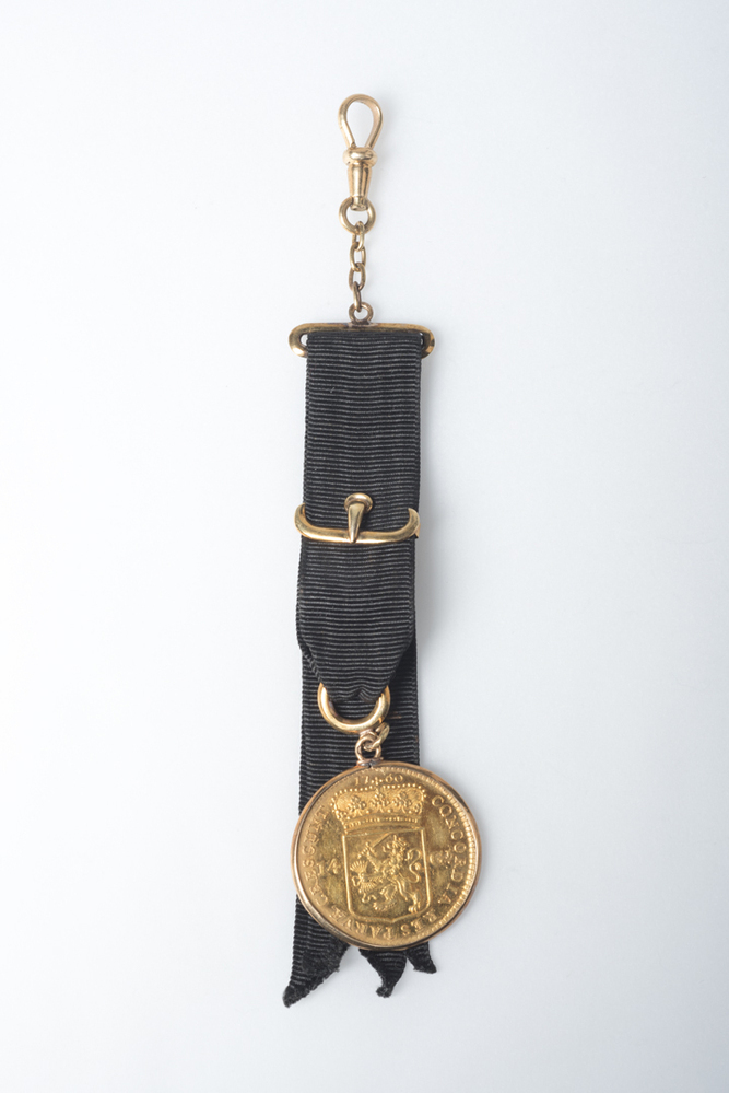 Horlogeketting met gouden rijder