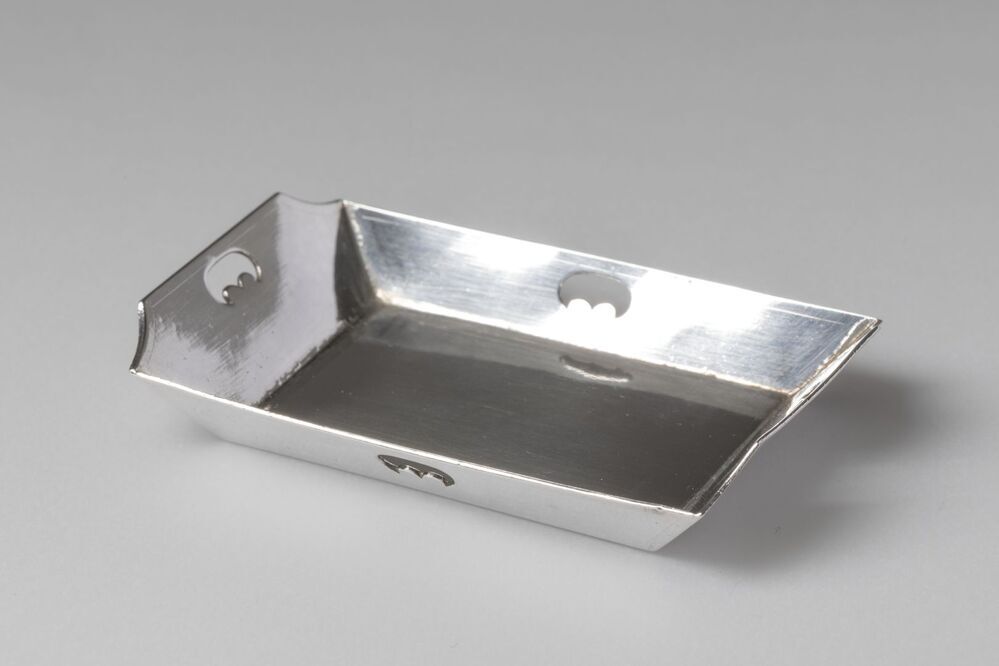 Miniatuur mangel- of linnenbak