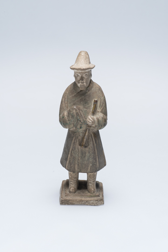 Grafbeeldje van een man met fluit