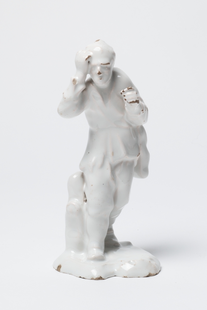 Beeldje van een bedelaar