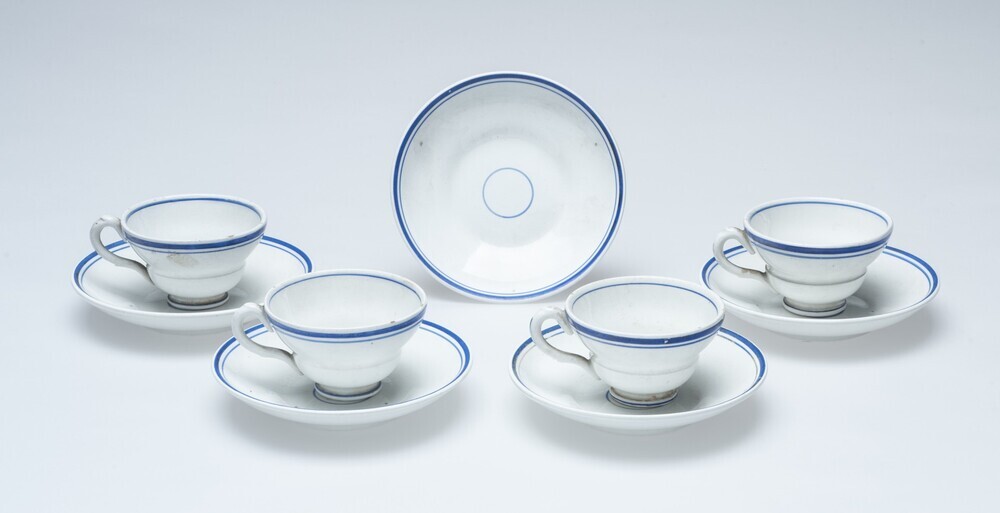 Miniatuurversie theekop en schotel