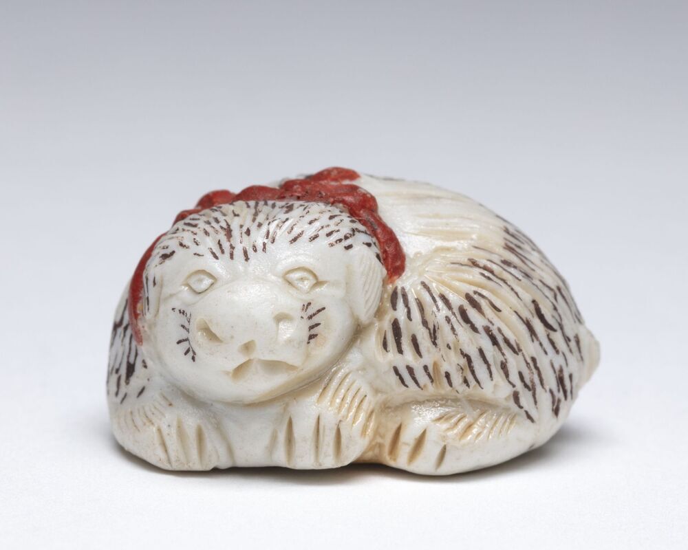 Netsuke, liggende hond