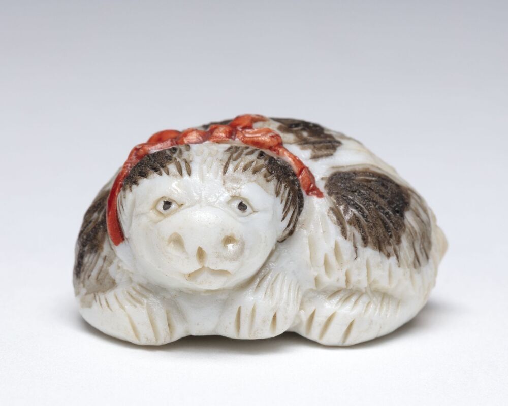 Netsuke, liggende hond