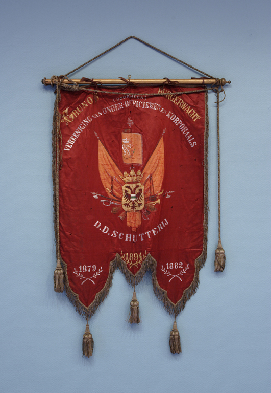 Vaandel van Gruno's burgerwacht (voorheen) Vereeniging van onderofficieren en korporaals dienst doende schutterij, opgericht 1879