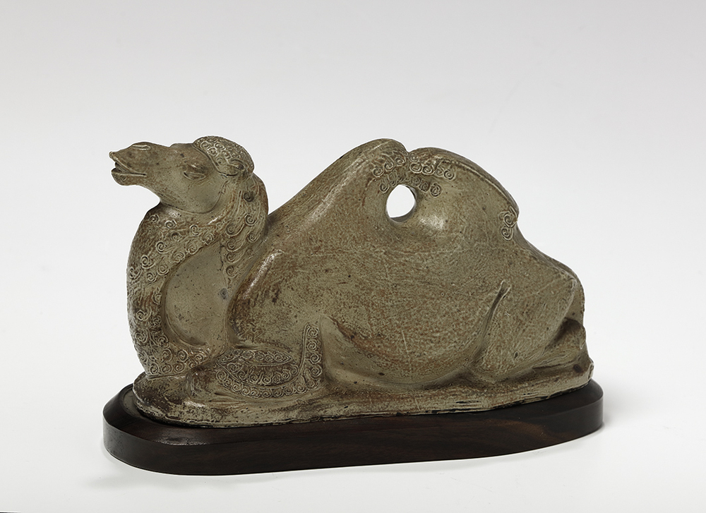 Liggend kameel van steengoed