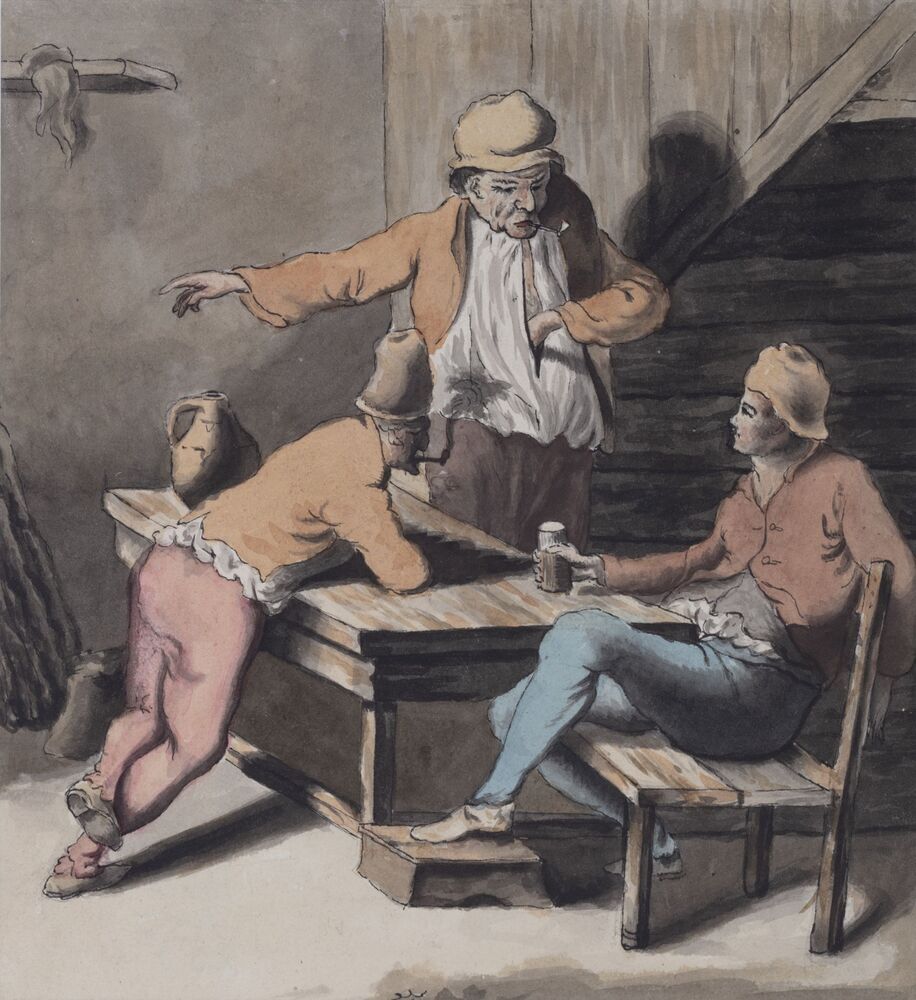 Drie mannen rond een tafel