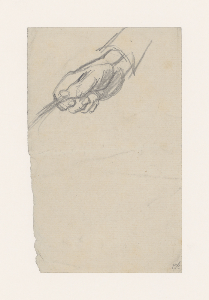 Hand, een schaar vasthoudende