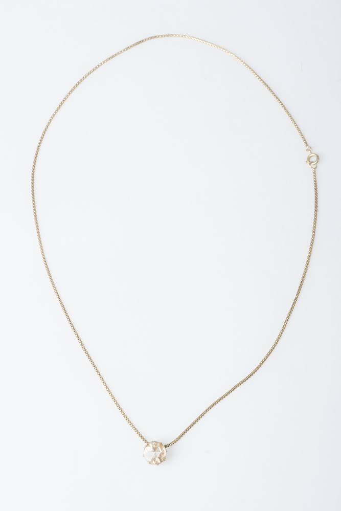Gouden ketting met grote diamant