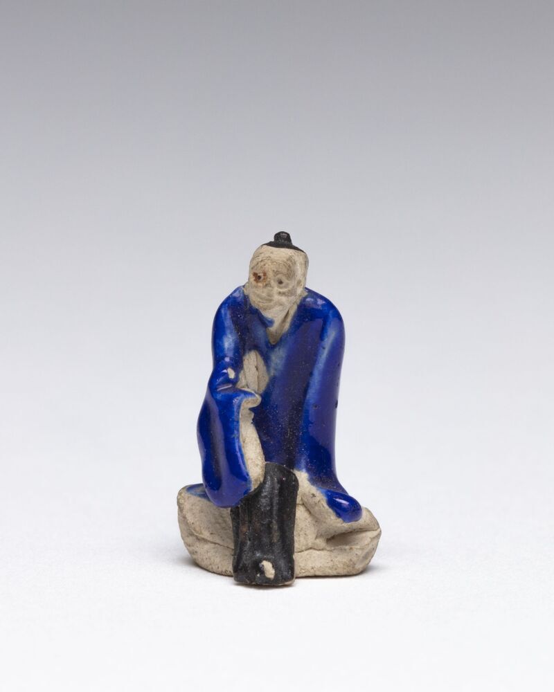 Beeldje van een Chinese man