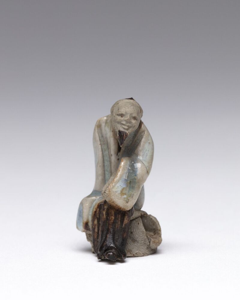 Beeldje van een Chinese man