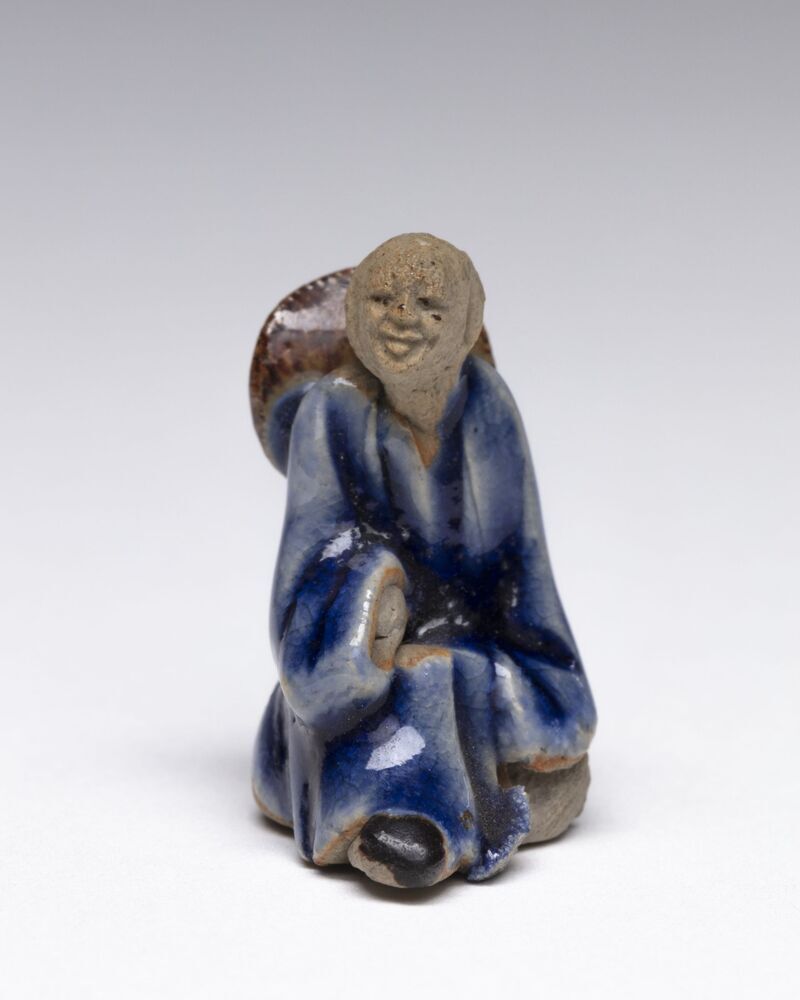 Beeldje van een Chinese man