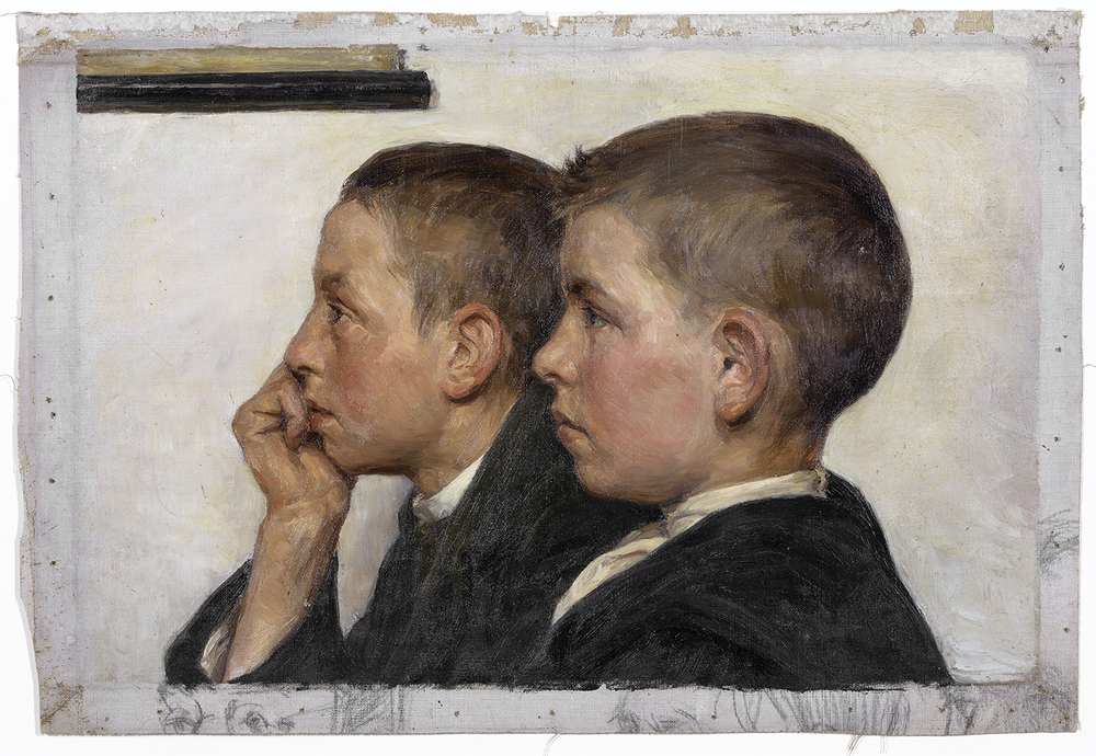 Twee jongenskoppen naar links