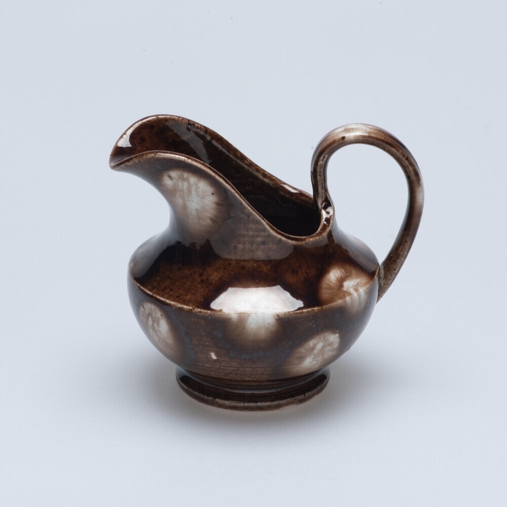 Miniatuurversie melk- of roomkan