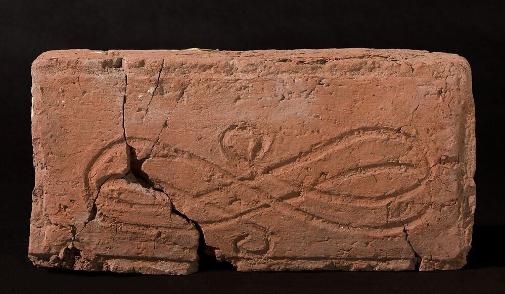 Grote baksteen met dubbele lemniscaat