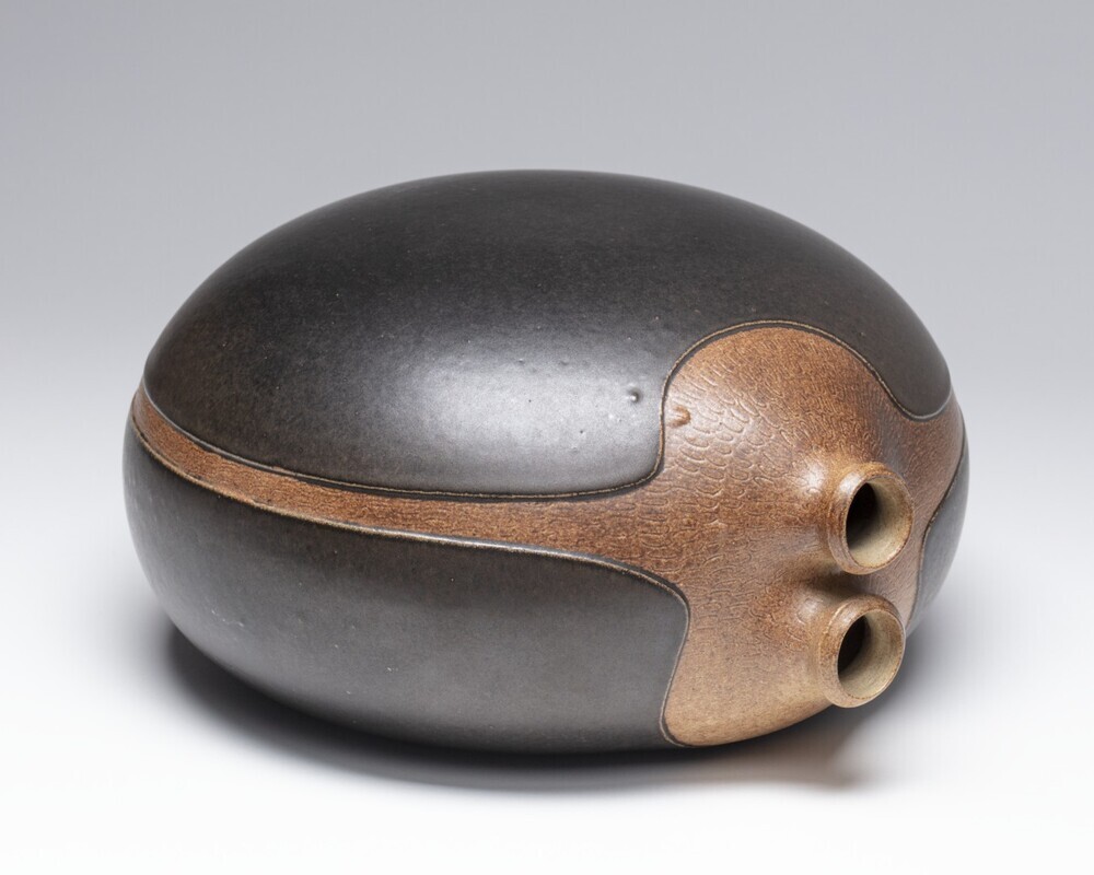 Keramische vorm met twee tuiten