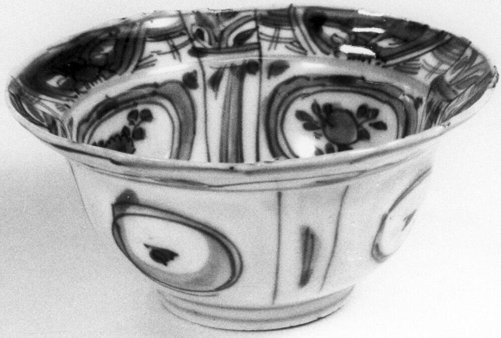 Klapmutskom met geluksymbolen