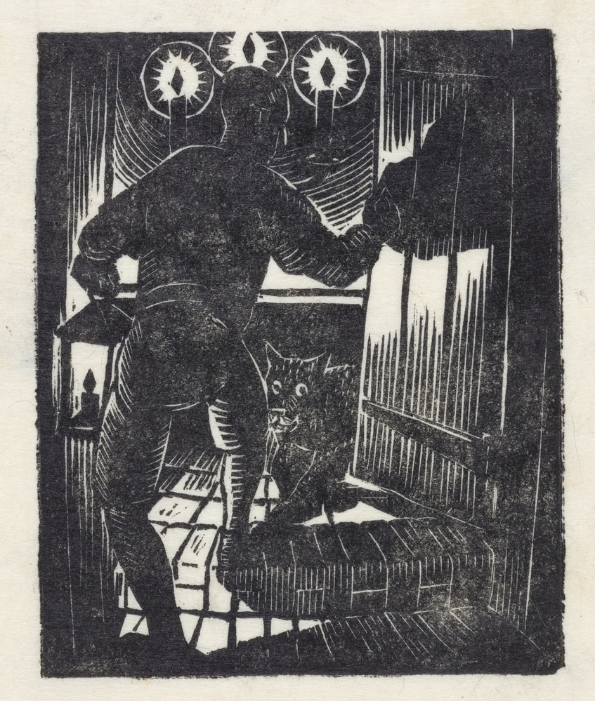 Hij zag een tafel met drie brandende kaarsen erop