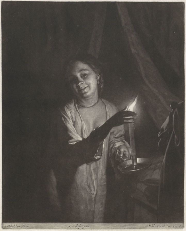 Vrouw bij kaarslicht