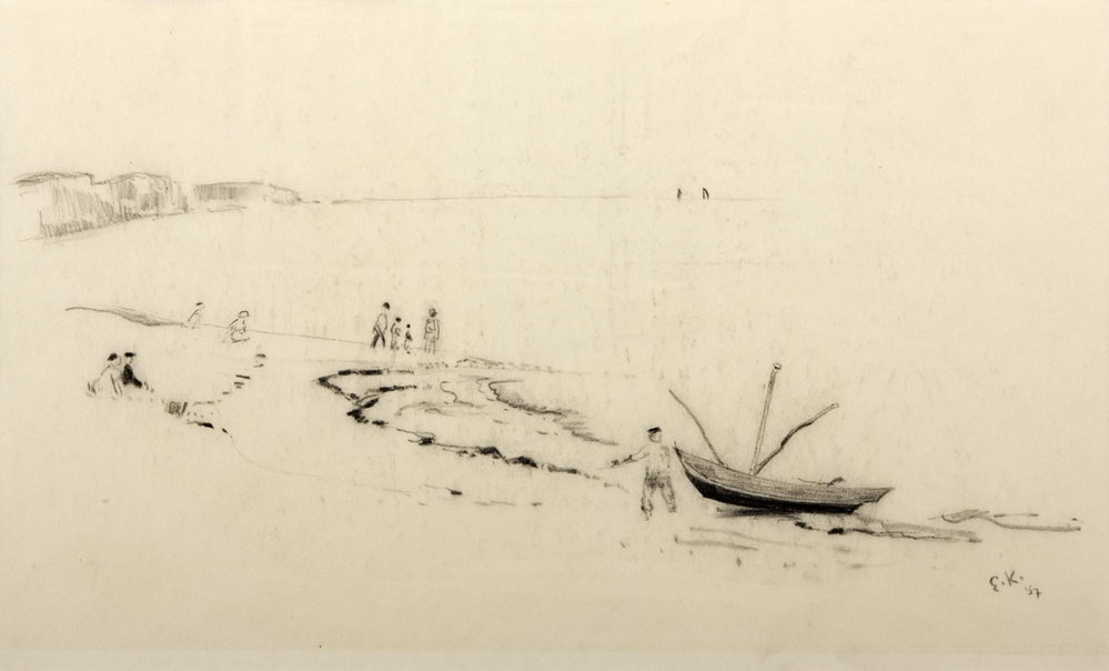 Strand met vissersboot