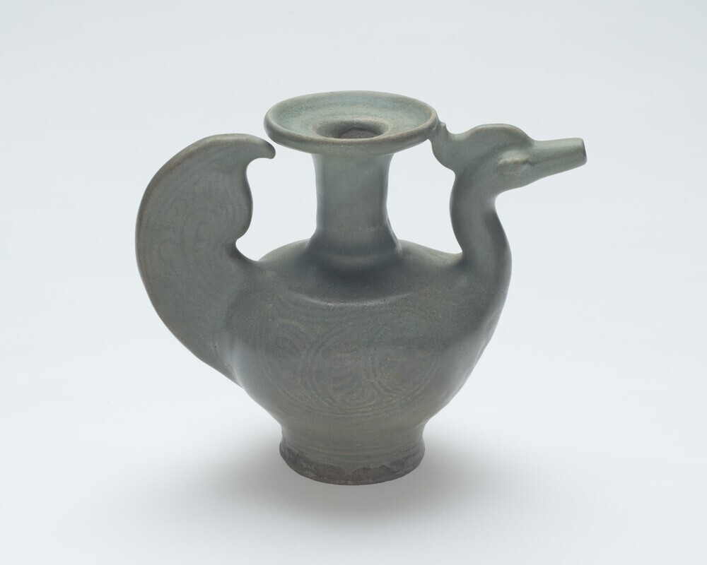 Kendi in de vorm van een hamsa-vogel