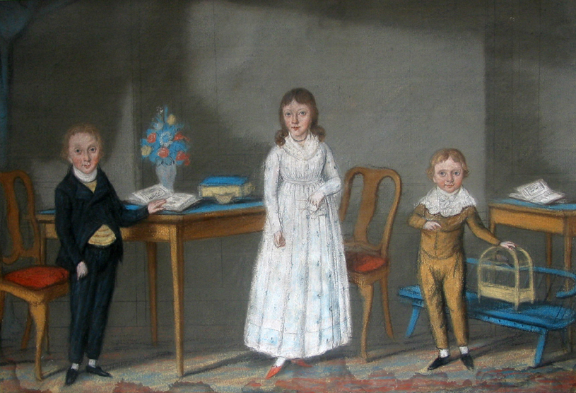 Drie kinderen in een interieur