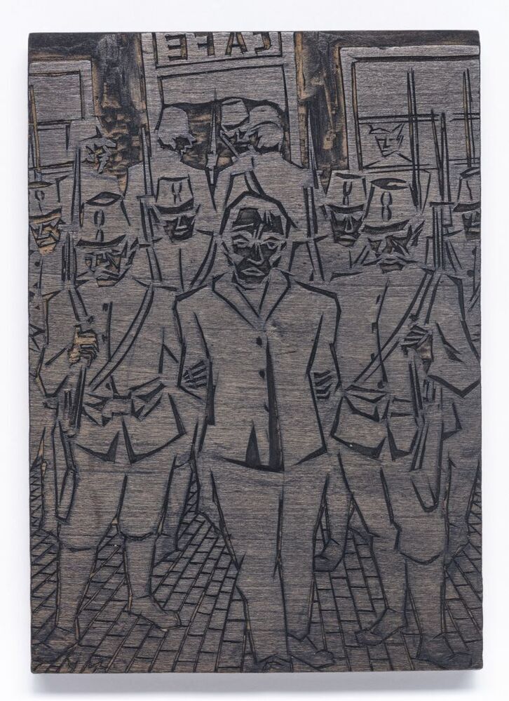 Houtblok van 'opgepakte man'