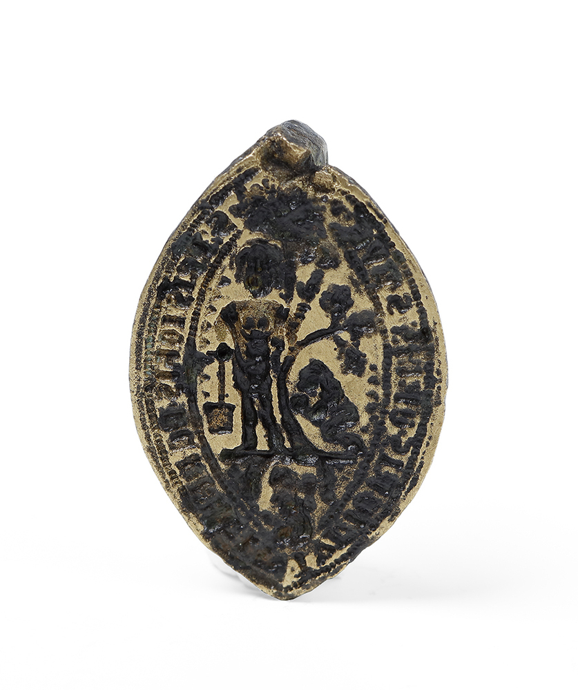 Zegelstempel van broeder Johannes (van Bedum?, Hellum?) met afbeelding van Sint Walfridus