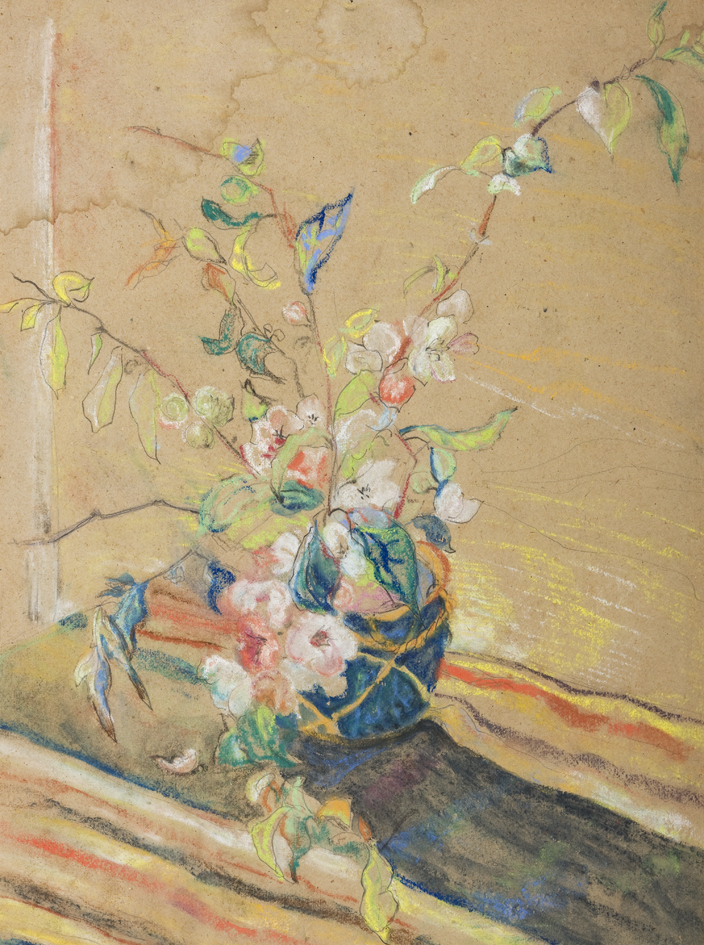 Pot met bloemen op tafelkleed