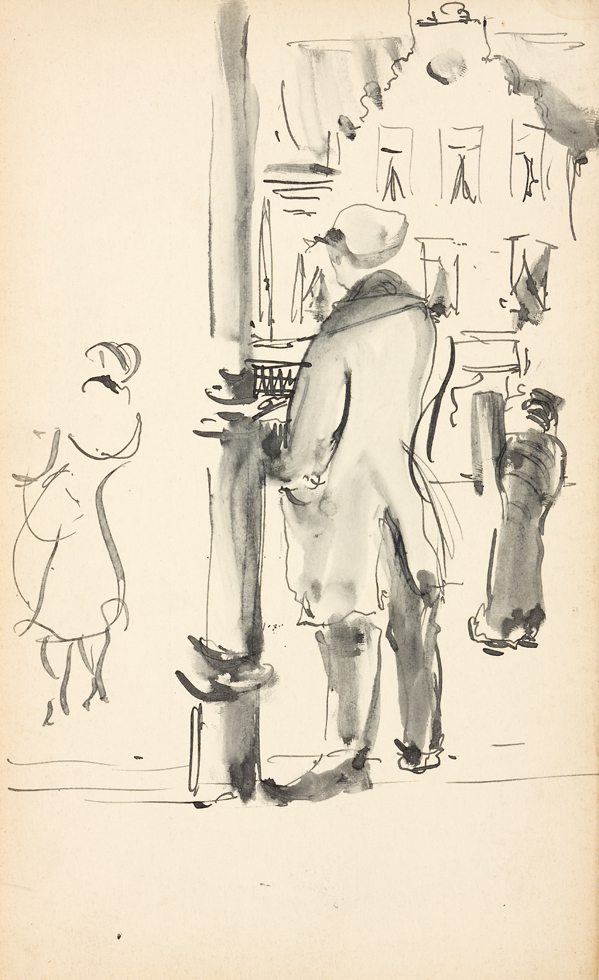 Man staande naast lantaarnpaal