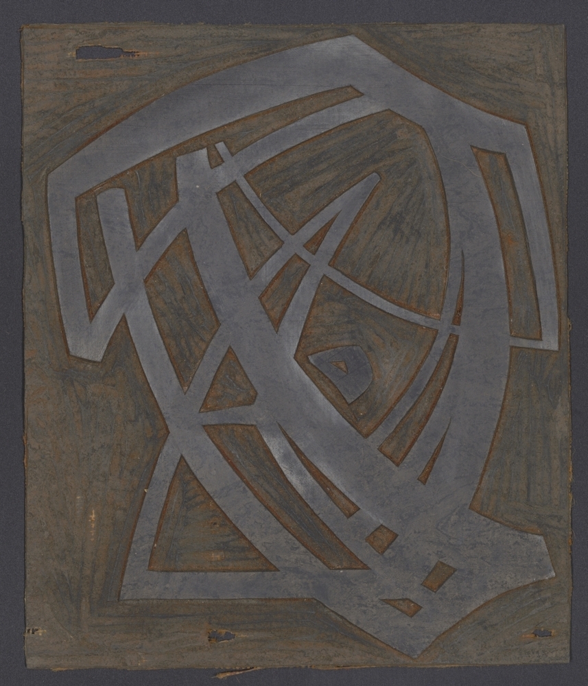 Linoleumblok, gebruikt voor afdrukken in rood/oranje