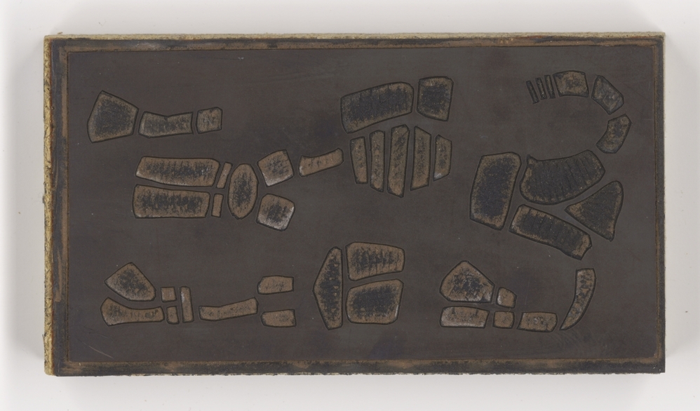 Witte uitsparingen op zwart fond (19 x 10) (linoleumblok)