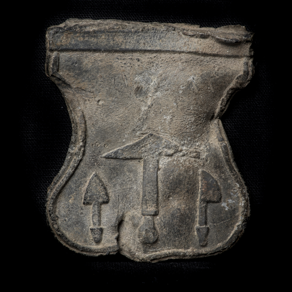 Trotseerlood afkomstig van museumgebouw Praediniussingel