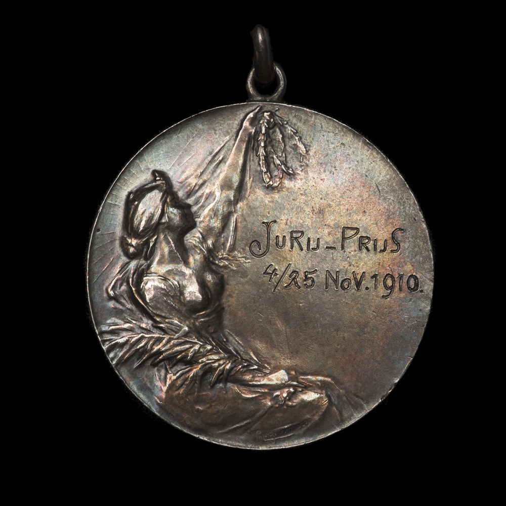 Medaille jurij prijs met inscriptie E.H. Ebels