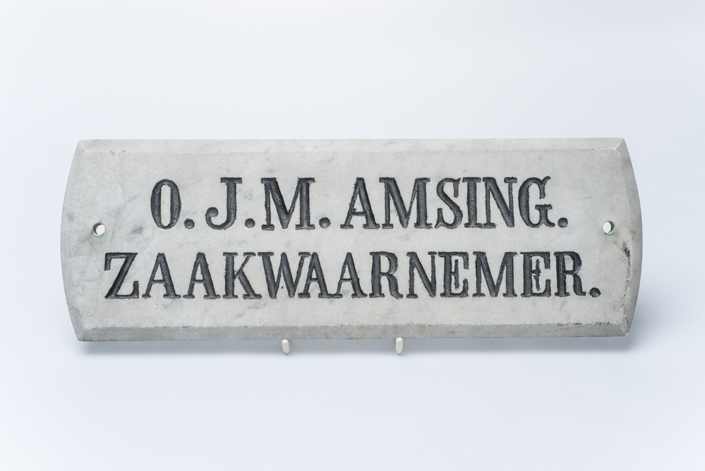 Naambord O.J.M. Amsing, zaakwaarnemer
