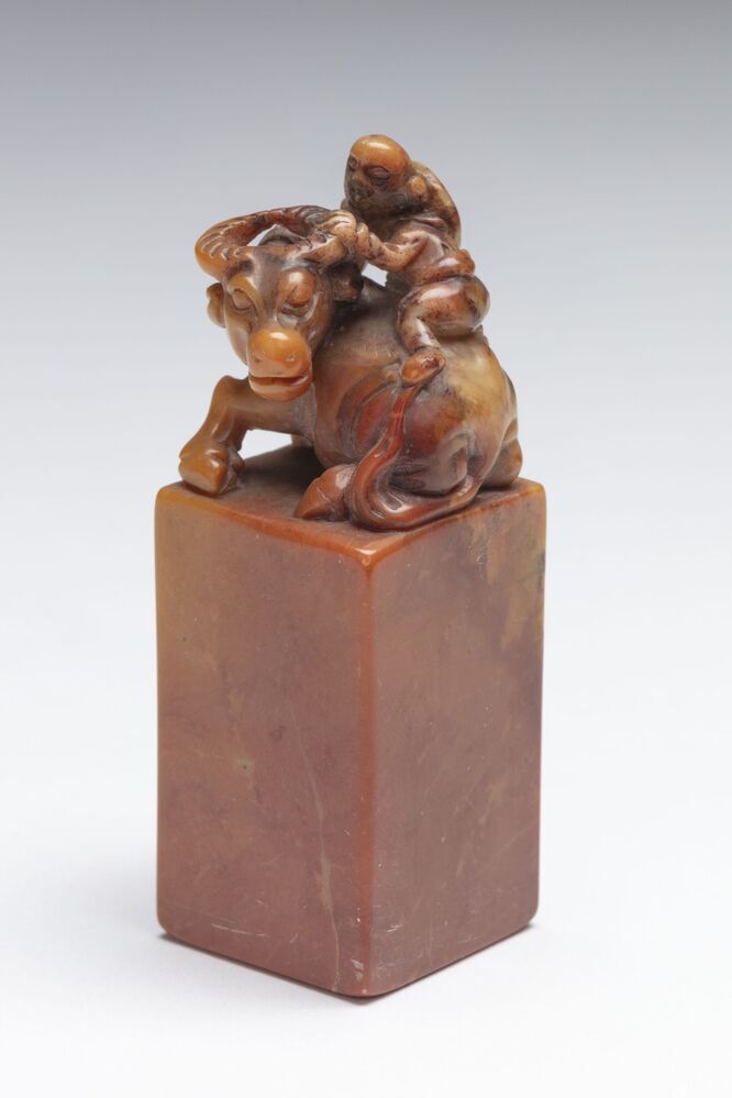 Zegelstempel met stier en rijder