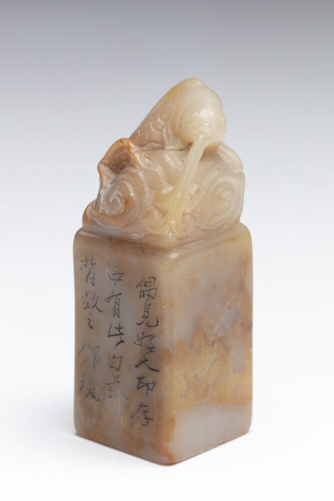 Zegelstempel met springende karper